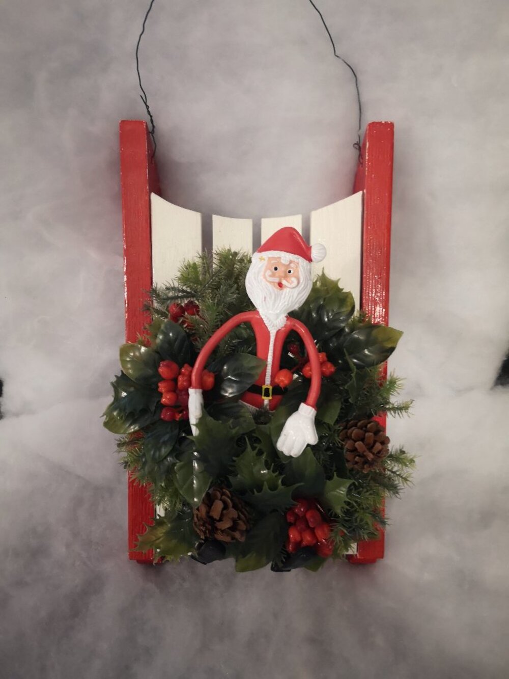 Christmas Wall Hanging  f/ Santa Figurine & Red/Green Foliage on Wooden Sleigh